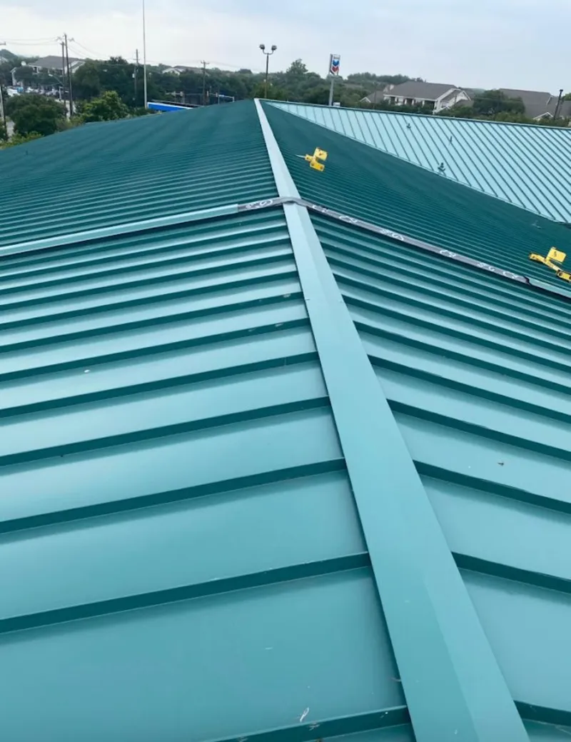 Green commercial metal roof ridge and valley for Metal Roof Repair in Big Lake