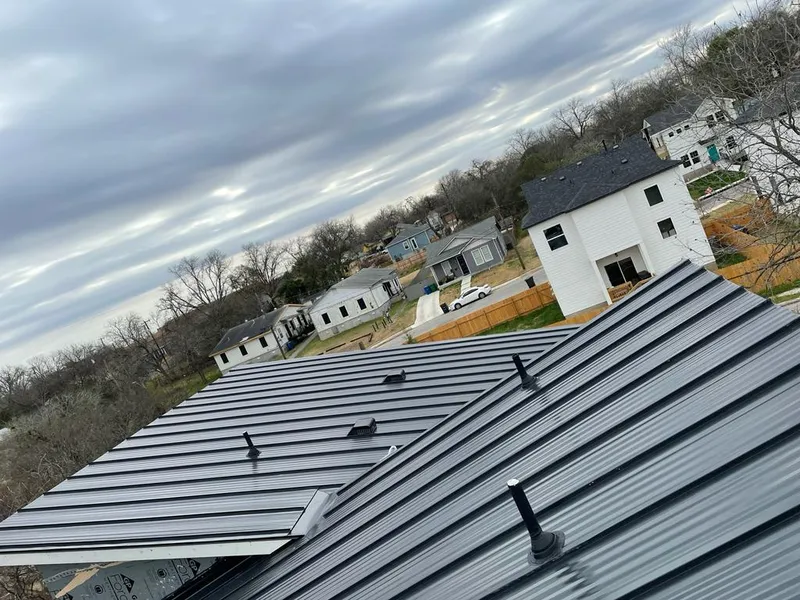 Standing seam metal roof panels with vents for Skylight Repair in Big Lake